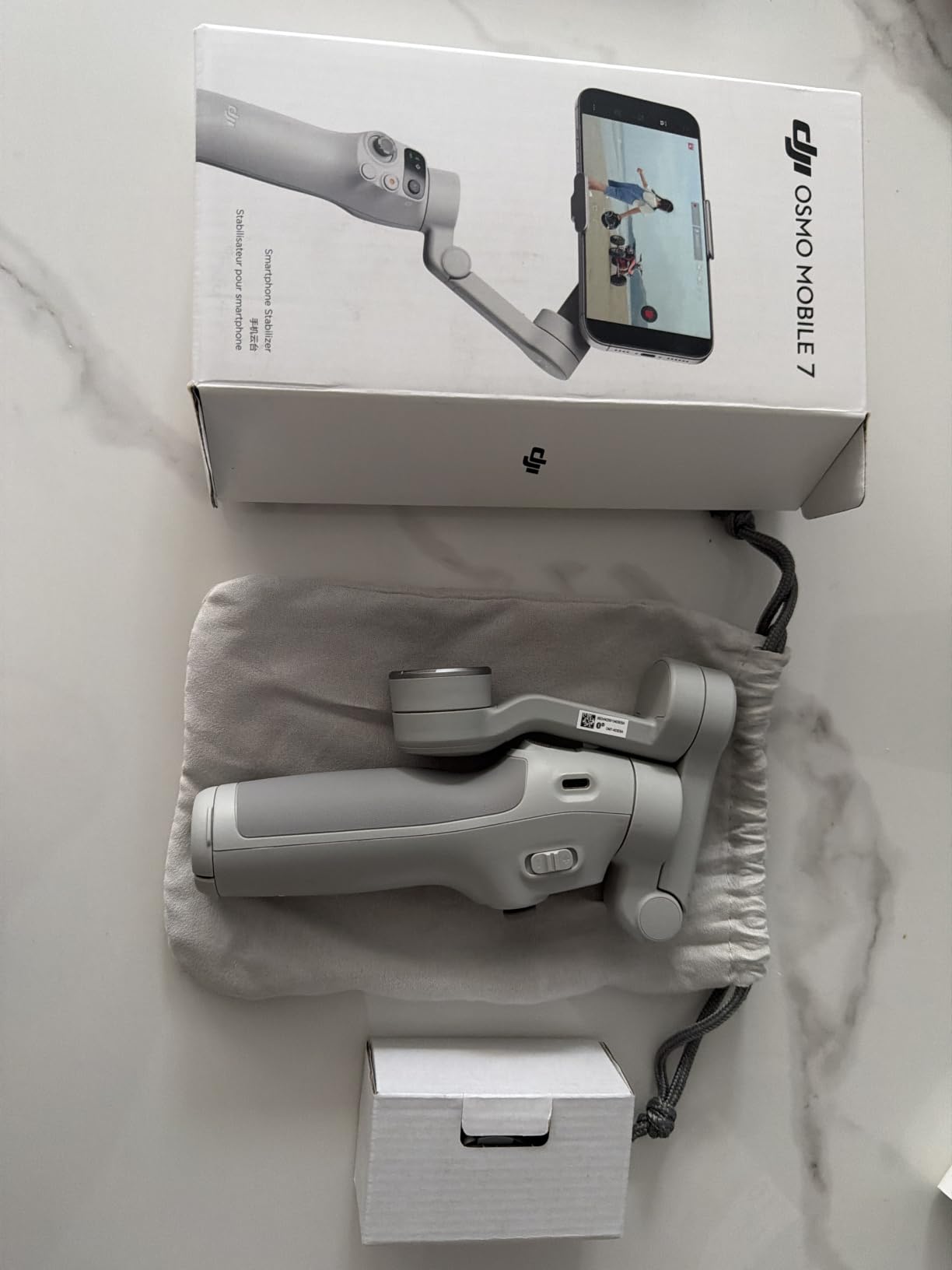DJI Osmo Mobile 7 Gimbal Stabilizer for iPhone, Android, 3-Axis Gimbal | Built-in Tripod, Ultra-Light, Comfortable Grip, ActiveTrack, ShotGuides, One-Tap Edit, 10hrs Use, Phone Charging customer photo 2