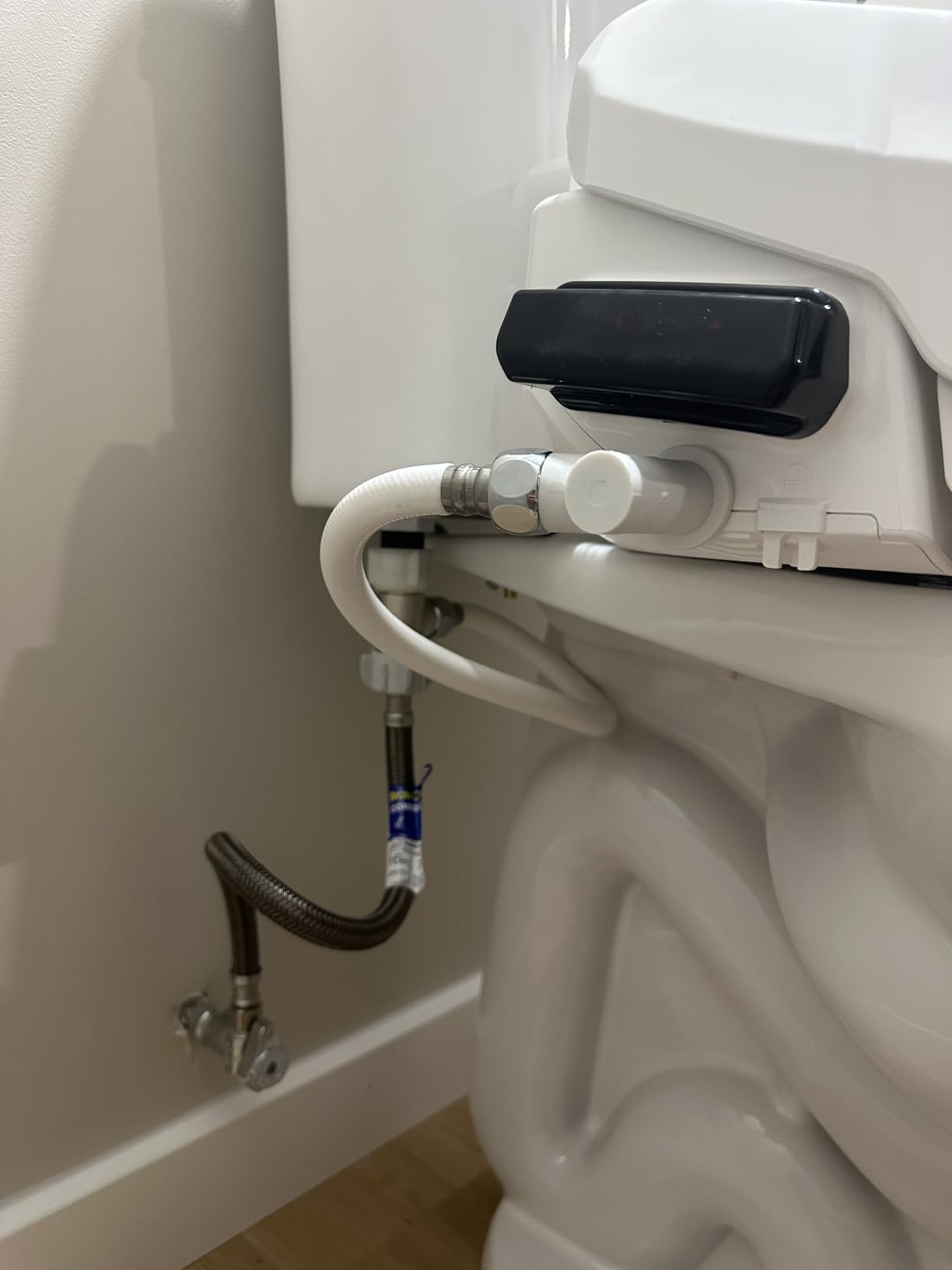 SmartBidet SB-1000WE Electric Smart Bidet Toilet Seat with Heated Seat, Warm Air Dryer, Temperature Control Wash, and Remote Control, Elongated Seat customer photo 1