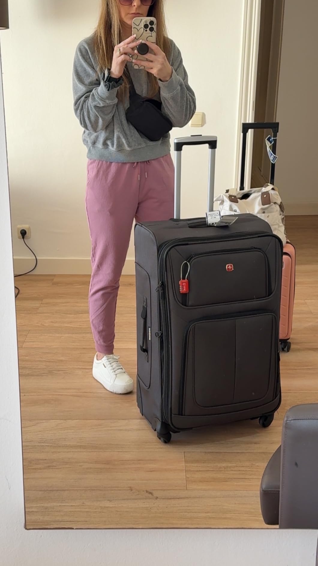 Sion Softside Expandable Spinner Luggage Durable Lightweight Travel Suitcase, Black, Checked-Large customer photo 1