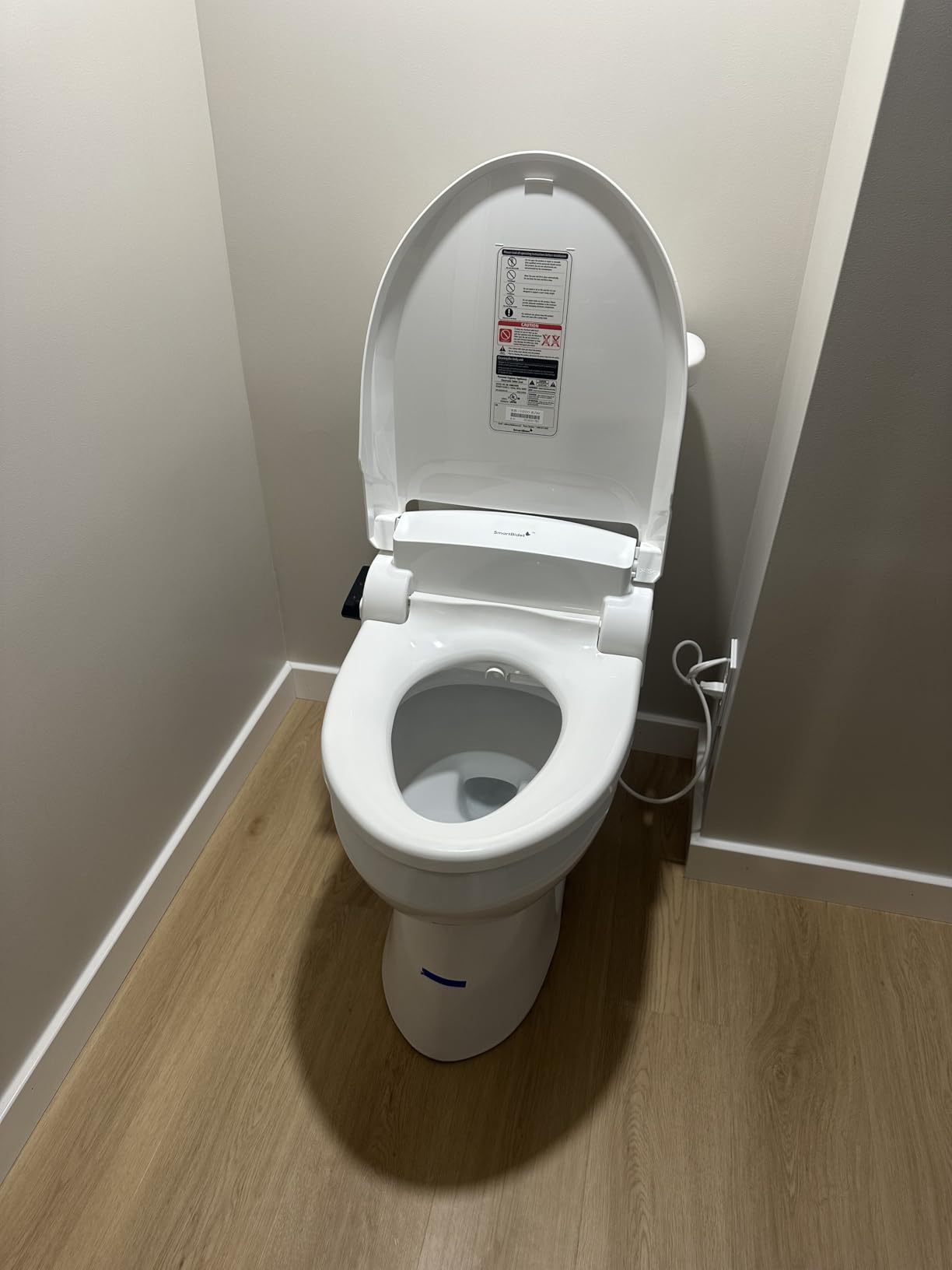 SmartBidet SB-1000 Electric Bidet Toilet Seat with 3-Year Warranty, Remote Control, Heated Seat, Warm Water, Air Dryer, Round customer photo 1