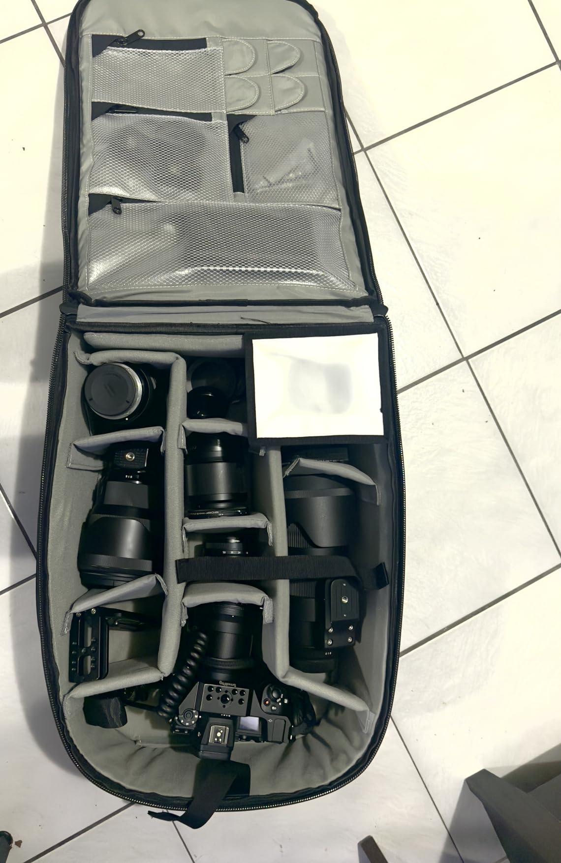 Neewer Convertible Rolling Camera Backpack for SLR/DSLR Cameras and Accessories (NW3300) -Black customer photo 2