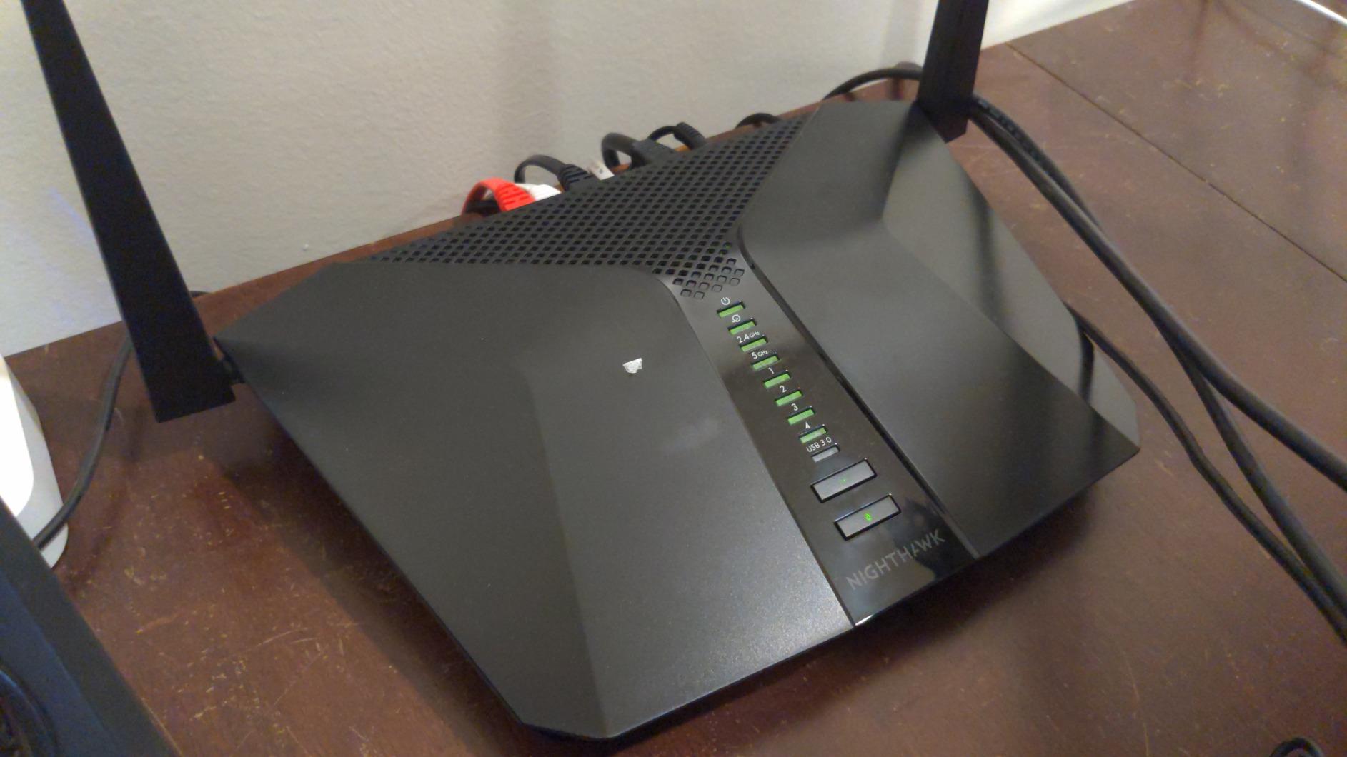 NETGEAR Nighthawk 4-Stream AX4 Wi-Fi 6 Router (RAX40) - AX3000 Wireless Speed (Up to 3 Gbps) | 1,500 Sq Ft Coverage customer photo 1