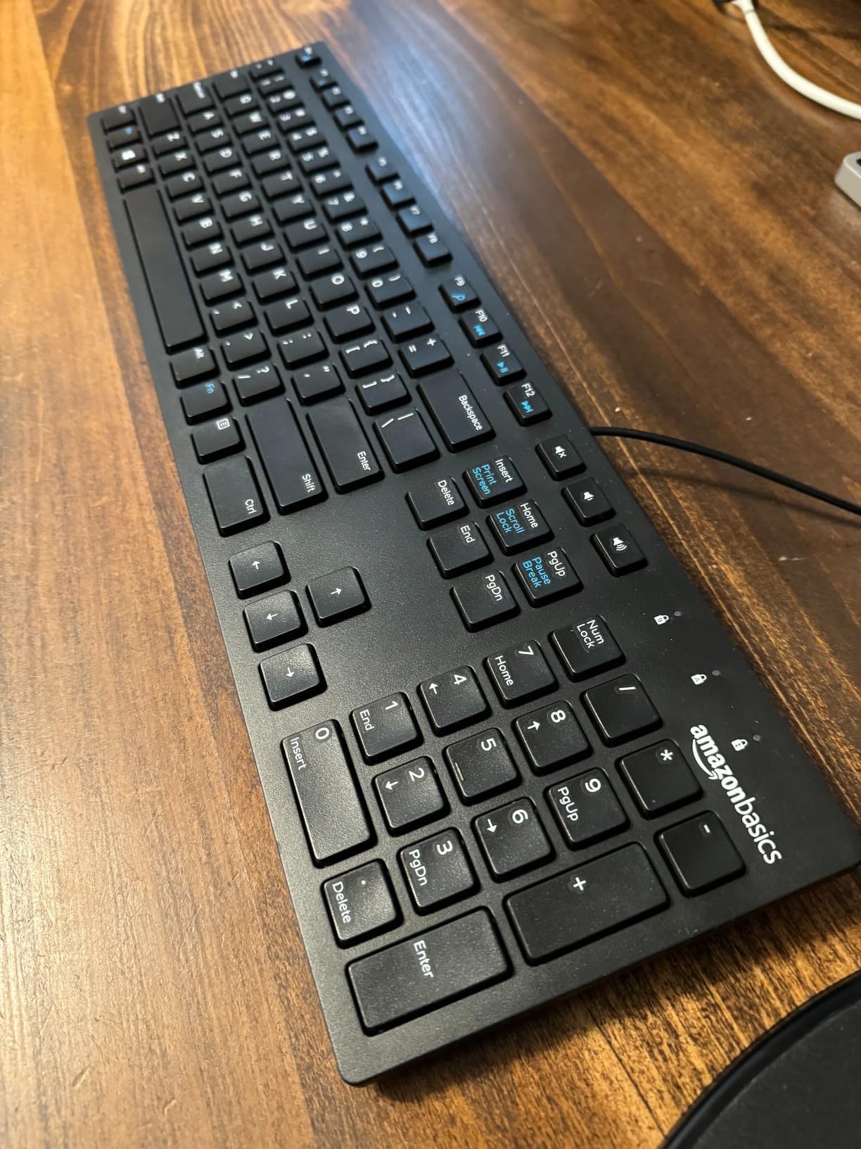 Amazon Basics Wired QWERTY Keyboard, Works with Windows, Plug and Play, Easy to Use with Media Control, Full-Sized, Black customer photo 1