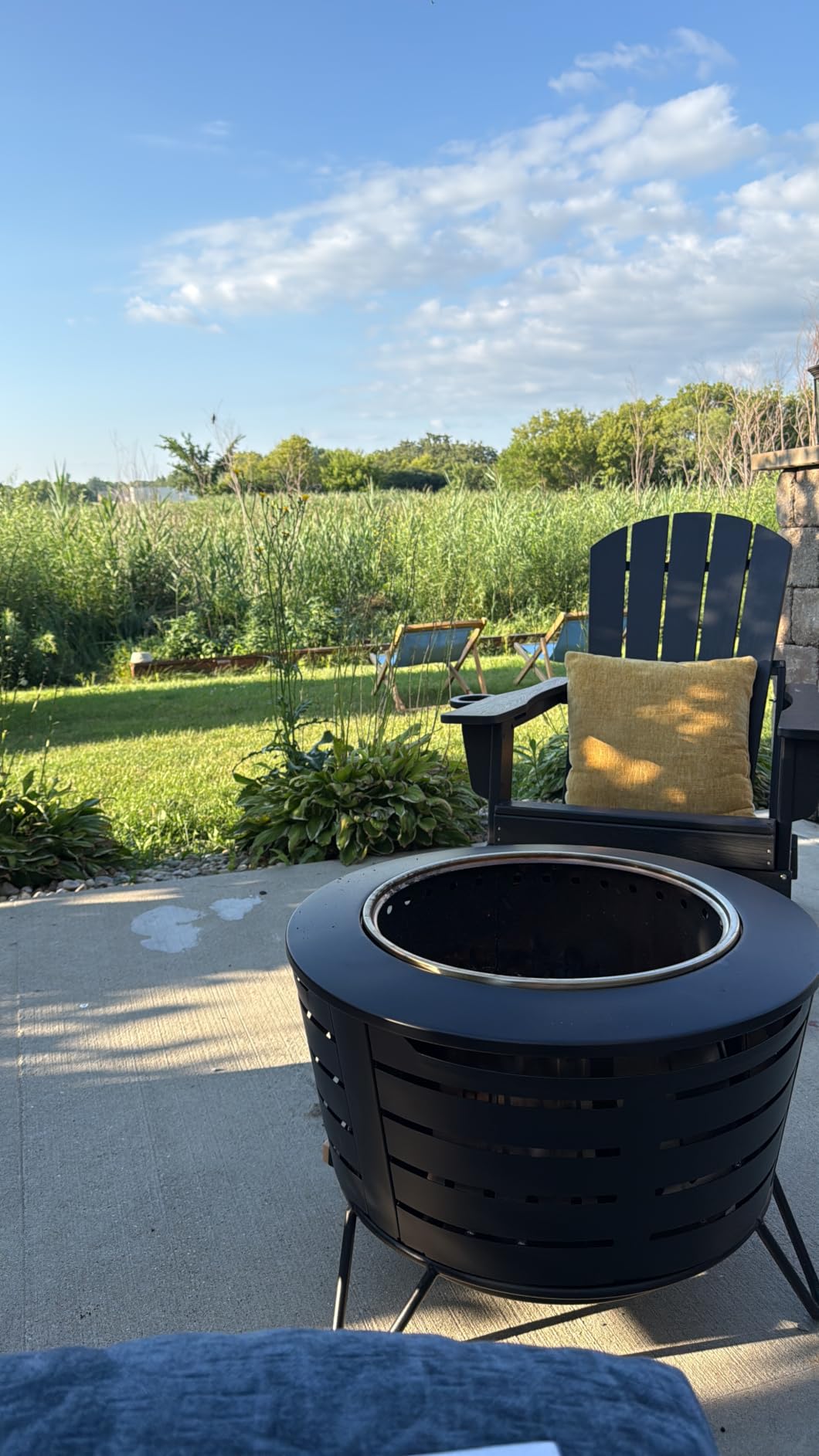 TIKI Patio Smokeless Fire Pit, 25 in Wood Burning Fire Pit with Cover | Black, Stainless Steel, Removable Ash Pan, Stand Included customer photo 1