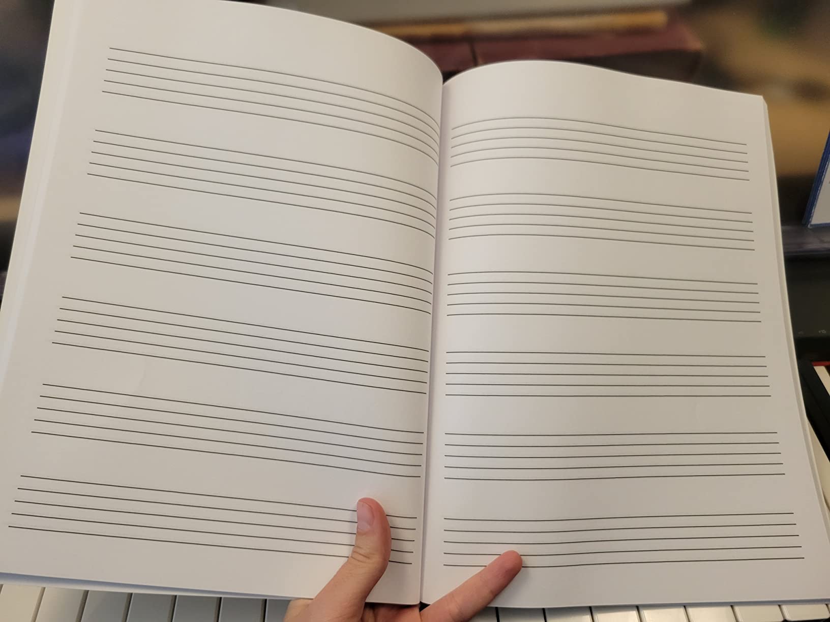 Wide Staff Music Manuscript Paper: 100 Blank Staff Pages with Music Notation Guide customer photo 2