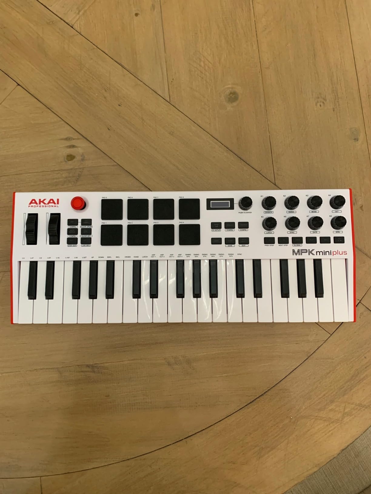 Akai Professional MPK Mini Plus 37-Key USB MIDI Keyboard Controller | Velocity-Sensitive Mini Keys, 8 MPC Pads, 64 Step Sequencer, MIDI/CV/Gate I/O, Software Suite Included, for Beat Makers customer photo 1