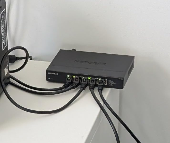NETGEAR 5-Port 2.5G Multi-Gigabit Ethernet Unmanaged Network Switch (MS305) - 5 x 2.5Gbps Ports, Desktop or Wall Mount, Metal Case customer photo 1