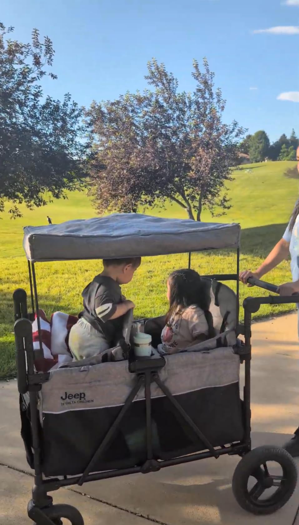 Jeep Wrangler Deluxe 4 Seater Stroller Wagon by Delta Children - Premium Quad Stroller Wagon for 4 Kids with Convertible Seats, Adjustable Push/Pull Handles, Removable Canopy & Flat Fold, Grey customer photo 2