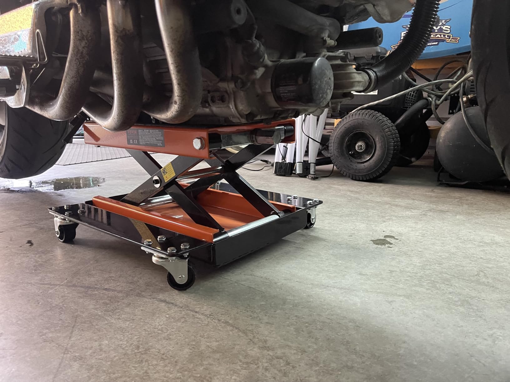 VEVOR Hydraulic Motorcycle Lift Table, 350 lbs Capacity Motorcycle Scissor Jack Lift with Wide Deck, J-Hooks, 4 Wheels, Hydraulic Foot-Operated Jack Stand for ATV Dirt Bikes | for Dirt bikes and Off-Road Motorcycles, with Foot Pedal, 4 Casters, Safety Pin, J-hook and Non-Slip 16.3 x 13.8 in Platform customer photo 2
