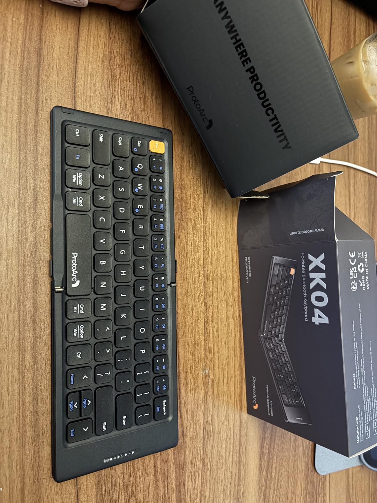 ProtoArc XK04 Foldable Compact Keyboard for Phone and Tablet, Black | Pocket-Sized, PU Leather Cover, Bluetooth 3-Device Workflow, On-the-go Typing customer photo 1