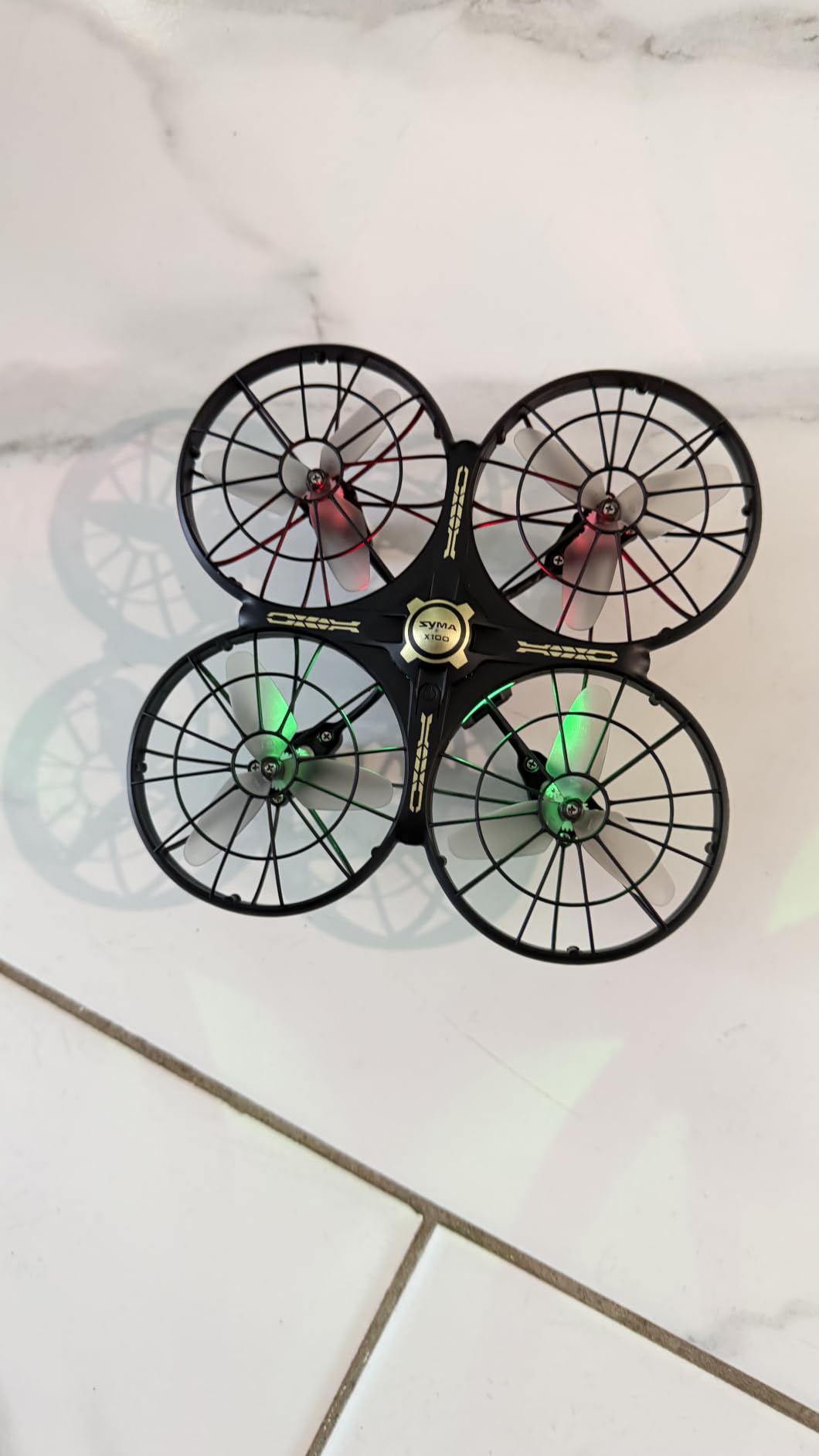 SYMA X100 Indoor Drone for Kids 8-12, Obstacle Avoidance, Full Guard | 20-Min Flight with 2 Batteries, One-key 360deg Flips, Altitude Hold and Full Propeller Guard for Safe Indoor Flying customer photo 2