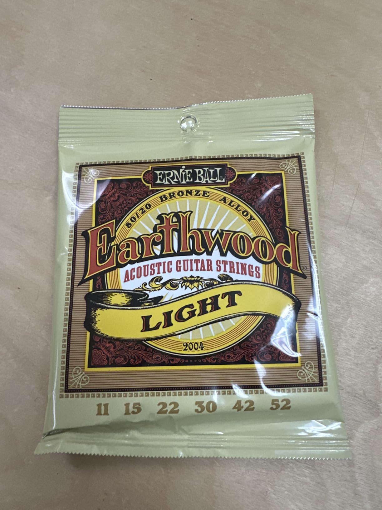 Ernie Ball Earthwood Medium Light 80/20 Bronze Acoustic Guitar Strings, 12-54 Gauge (P02003) customer photo 1