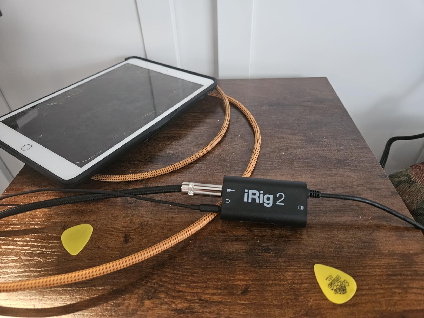 IK Multimedia iRig 2 portable guitar audio interface, lightweight audio adapter for iPhone and iPad with instrument input and headphone/amplfier outs customer photo 1