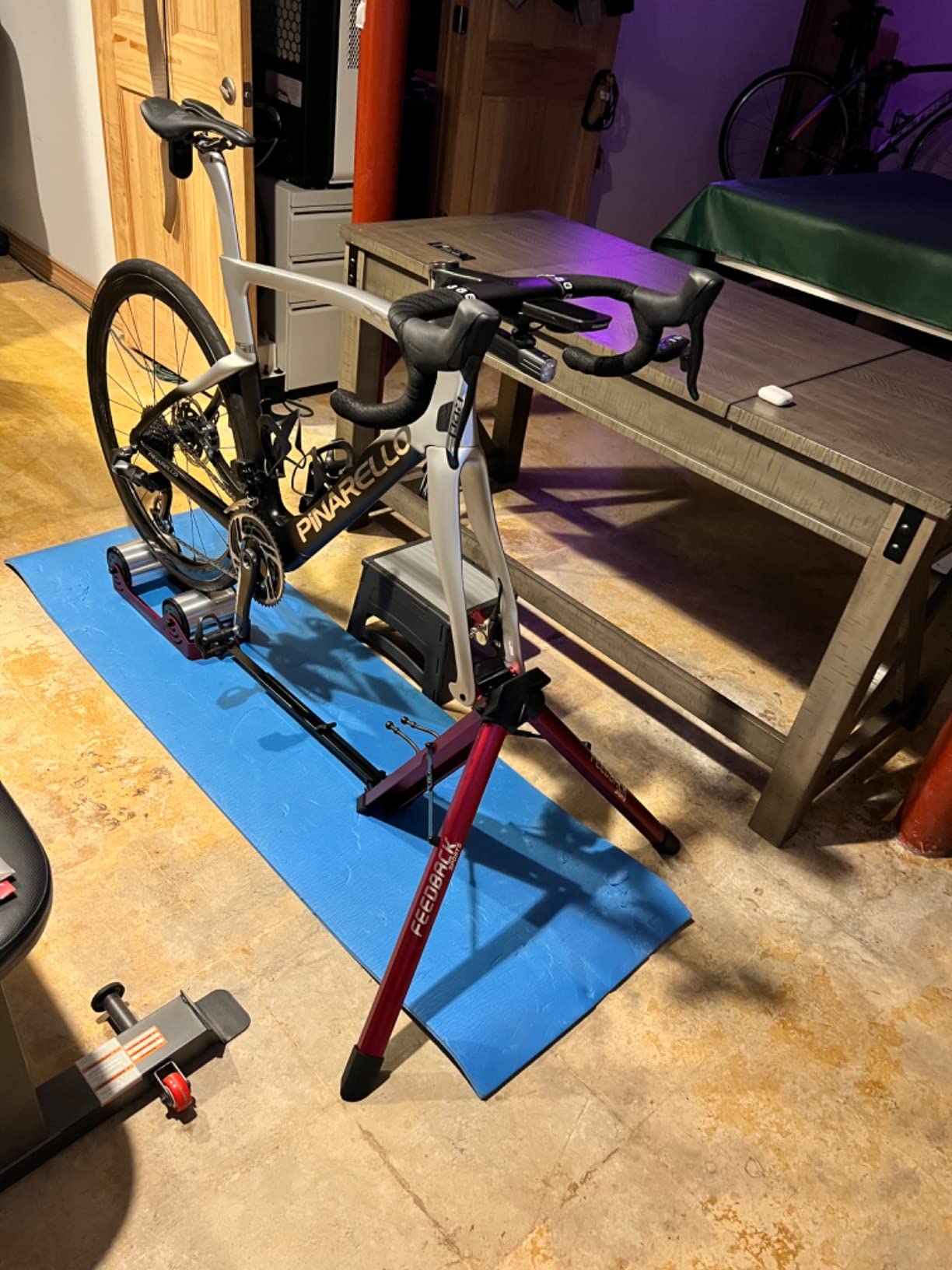 FEEDBACK SPORTS | Omnium Lightweight and Portable Bike Trainer | for 16” to 29” Wheels | Travel Bag Included customer photo 1