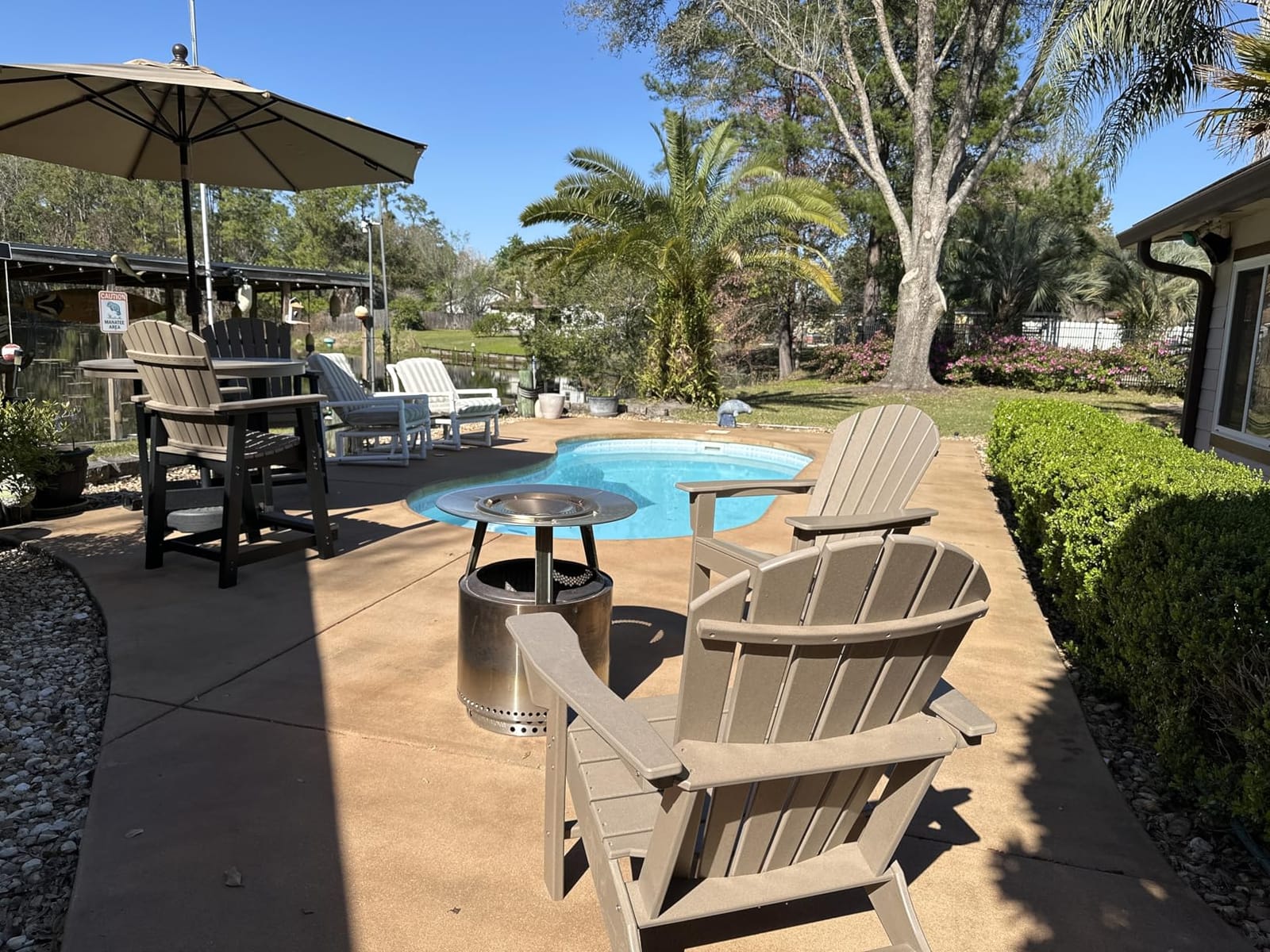 Signature Design by Ashley 1-Piece HDPE Outdoor Adirondack Chair, Driftwood | Durable weather resistant HDPE, 36-pound stationary frame, Comfortable 16.25-inch elevated seat, Sundown Treasure Series customer photo 2