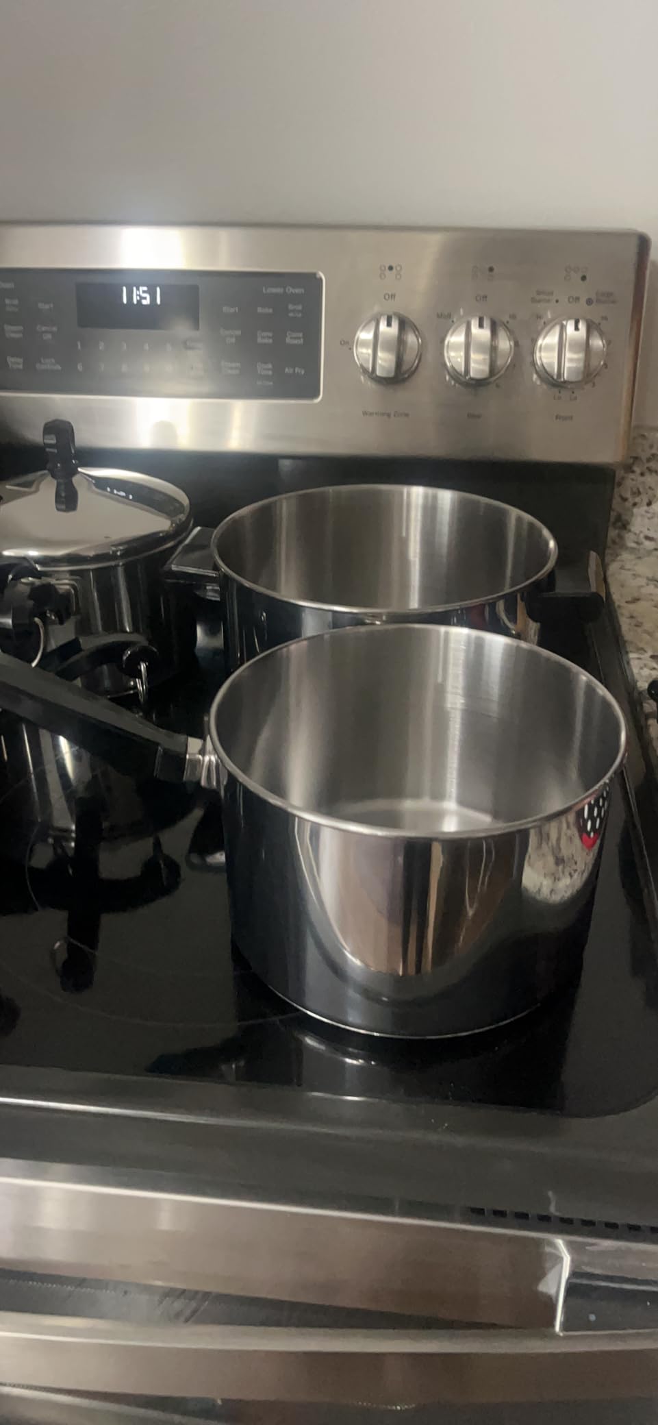 Farberware Classic Series Stainless Steel Pots and Pans with Baking Sheet Pan, Cooking Tools, and Lids, Induction Ready, Dishwasher Safe, 10 Piece Cookware Set, Metal Utensil Safe - Stainless Steel customer photo 1